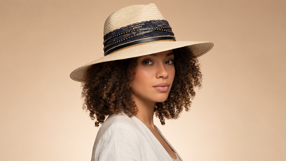 Woman wearing a transitional wide-brim fall hat.