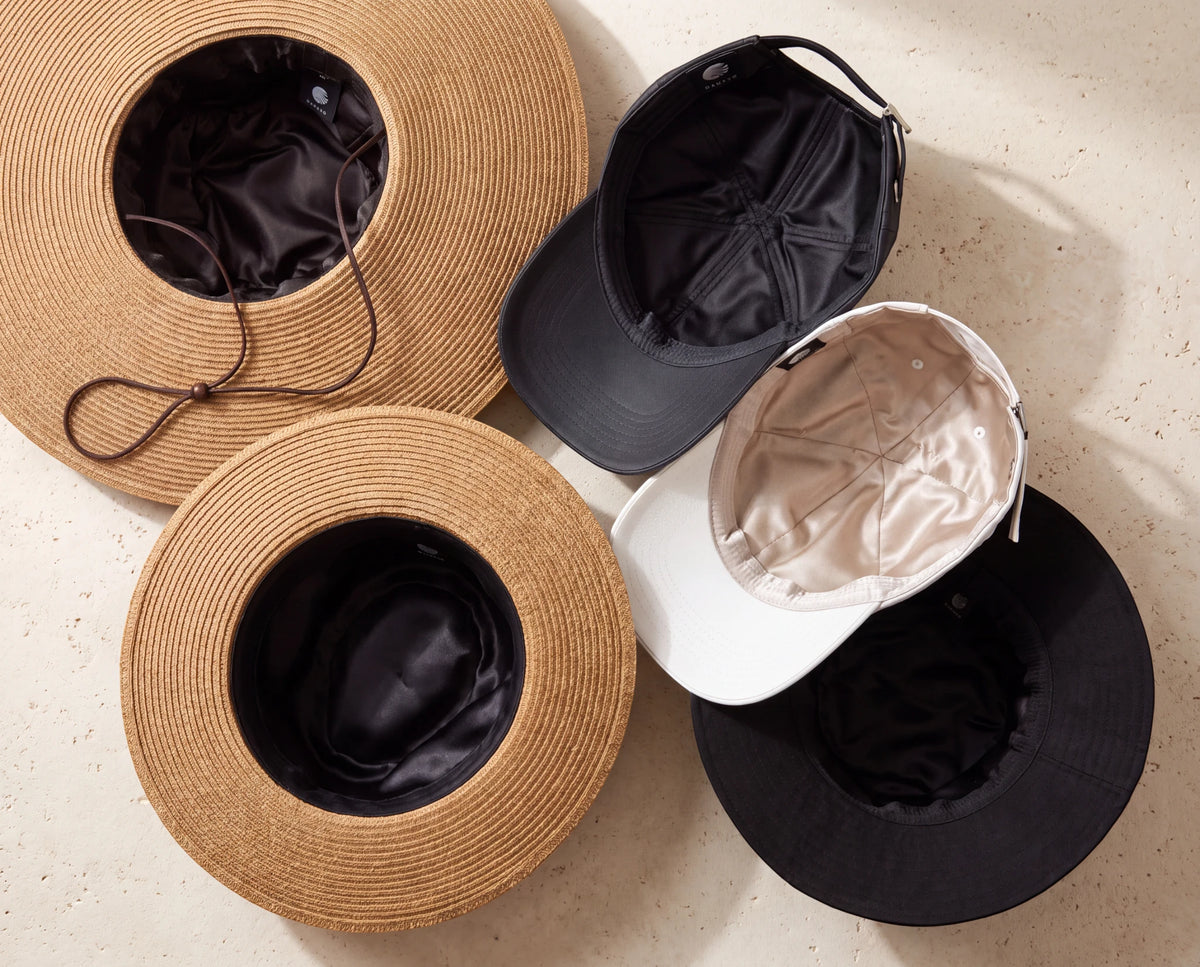 Inside Damazo straw hats and caps, showing the silk-lined crowns