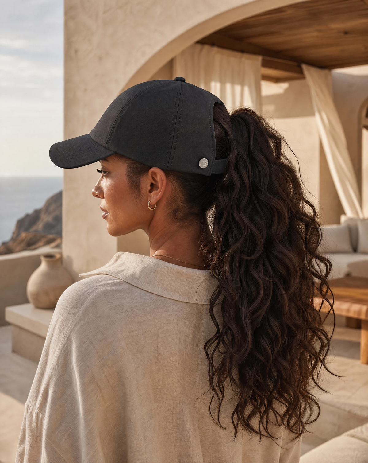 Woman wearing a Damazo Veloura silk-lined cap
